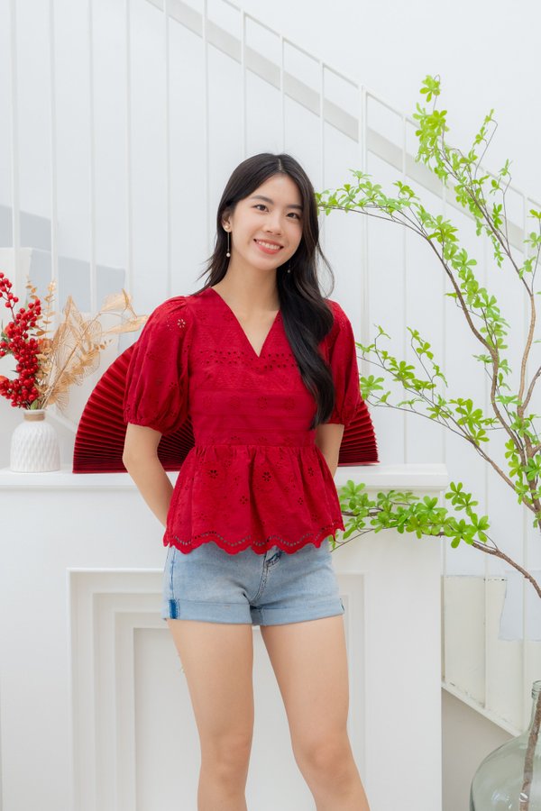 Mel Eyelet Peplum Top In Red